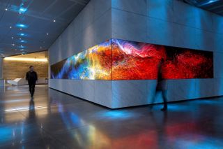 A 62-foot-wide Orchid 1.9mm LED display from SiliconCore wraps in an L-shape around Dolby's lobby, immersing viewers in 7.1 million pixels.