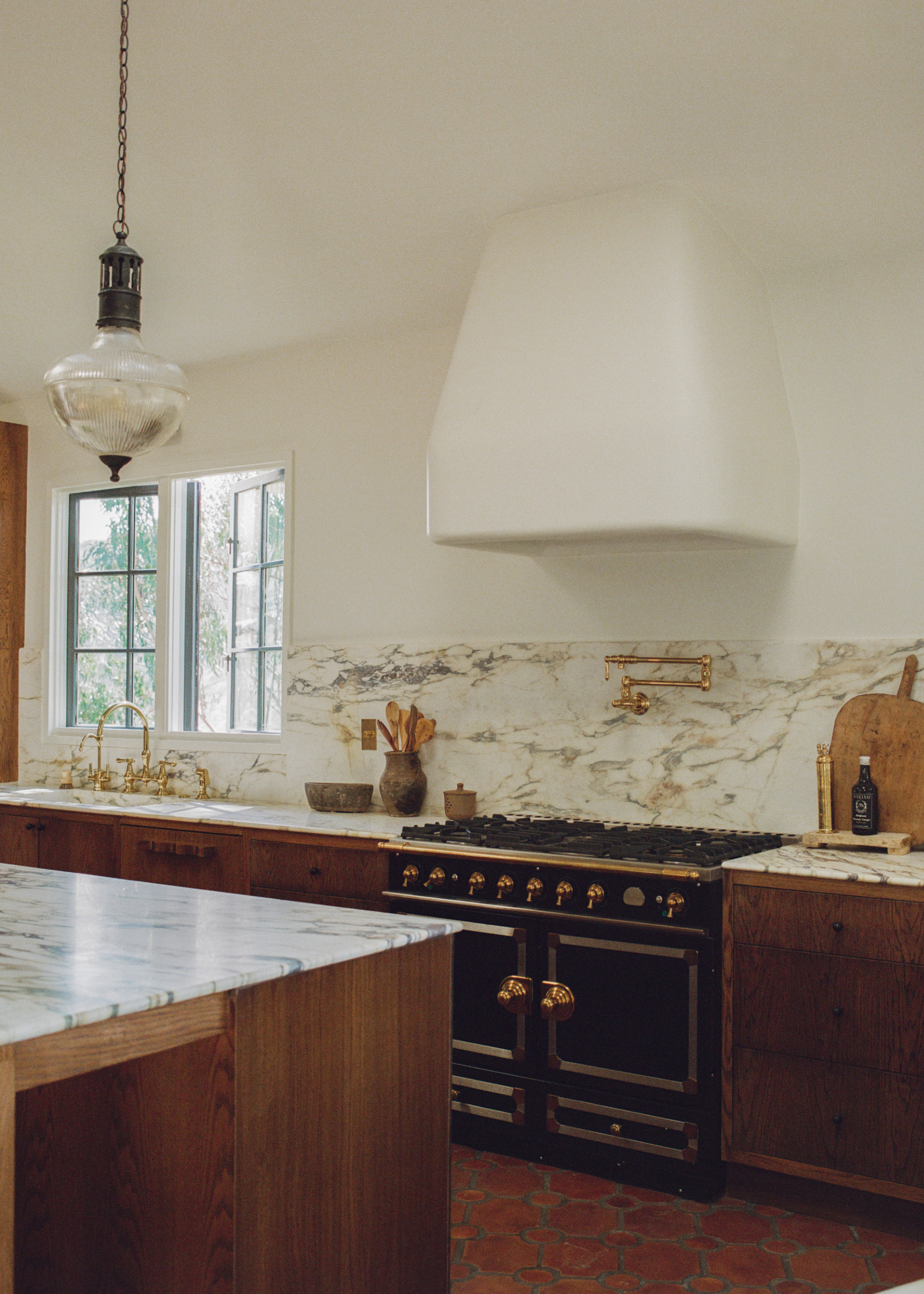 A kitchen that uses natural stone for a luxe finish