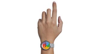 New TTT watch featuring rainbow pinwheel design.
