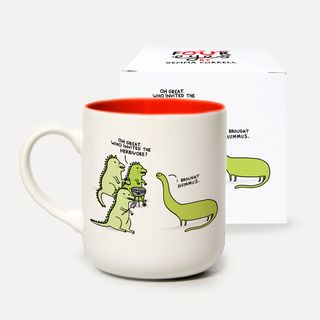 tea cup with dinosaur print and white