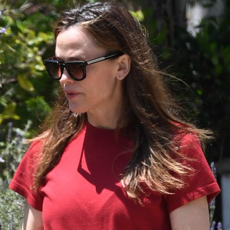 Jennifer Garner wore her cuffed jeans outfit with the chunky sneakers trend