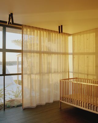 glass wall and transparent curtains in australia