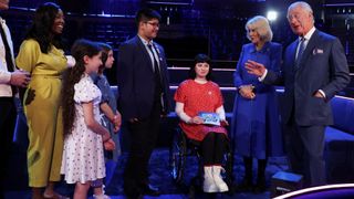 King Charles III and Camilla, Queen Consort meet the presenters and invited viewers of TV show 'Blue Peter'
