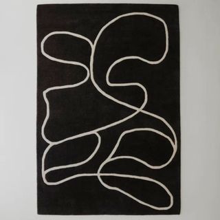 Black rug abstract pattern cut out