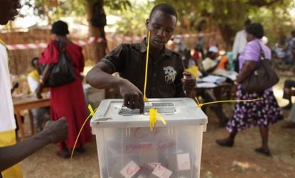 A Southern Sudanese man casts his ballot during the second day of voting on the independence referendum that would split the Sudanese nation into two countries.