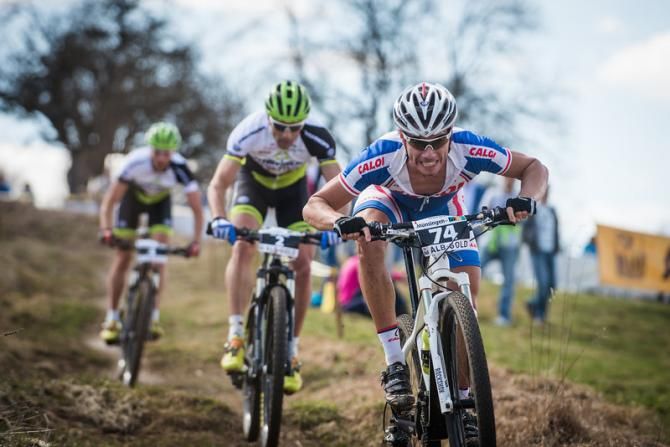 Henrique Avancini leads Jose Hermida and Rudi van Houts
