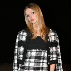 a paparazzi photo of a white woman with blonde hair