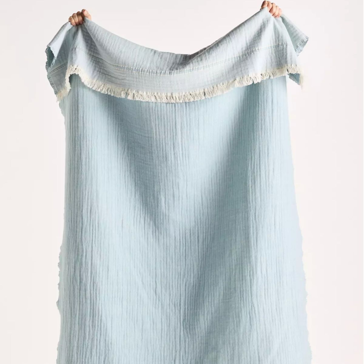 A baby blue throw