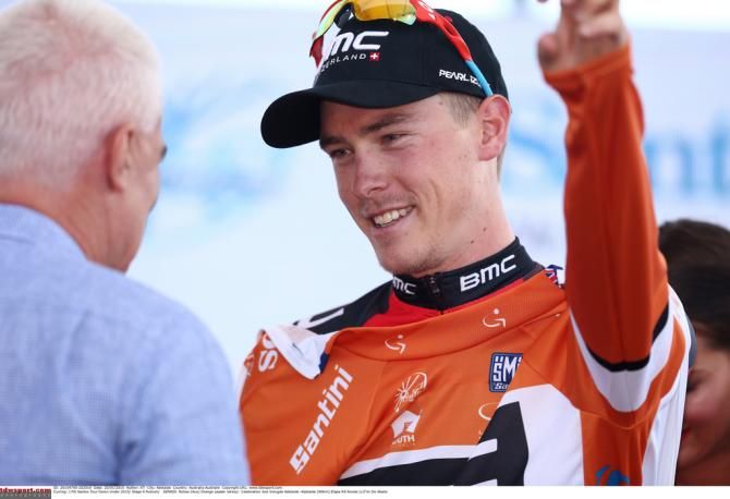 Rohan Dennis (BMC) pulls on the ochre leader's jersey as the winner of the Tour Down Under