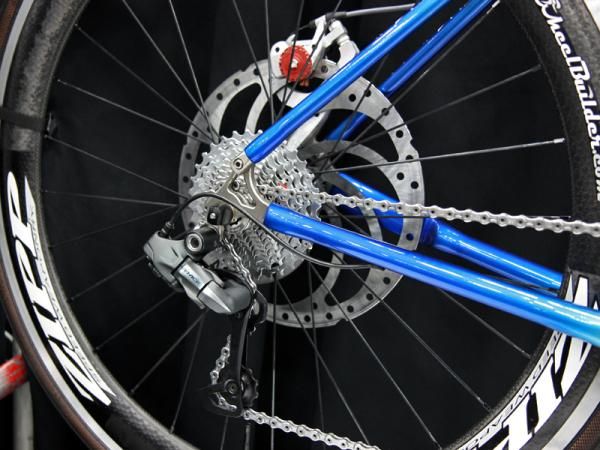 Check out the rotor diameter on this Calfee carbon tandem! The standard Shimano Dura-Ace Di2 pulley cage is traded out for a mountain cage to handle a wider gear range, too.