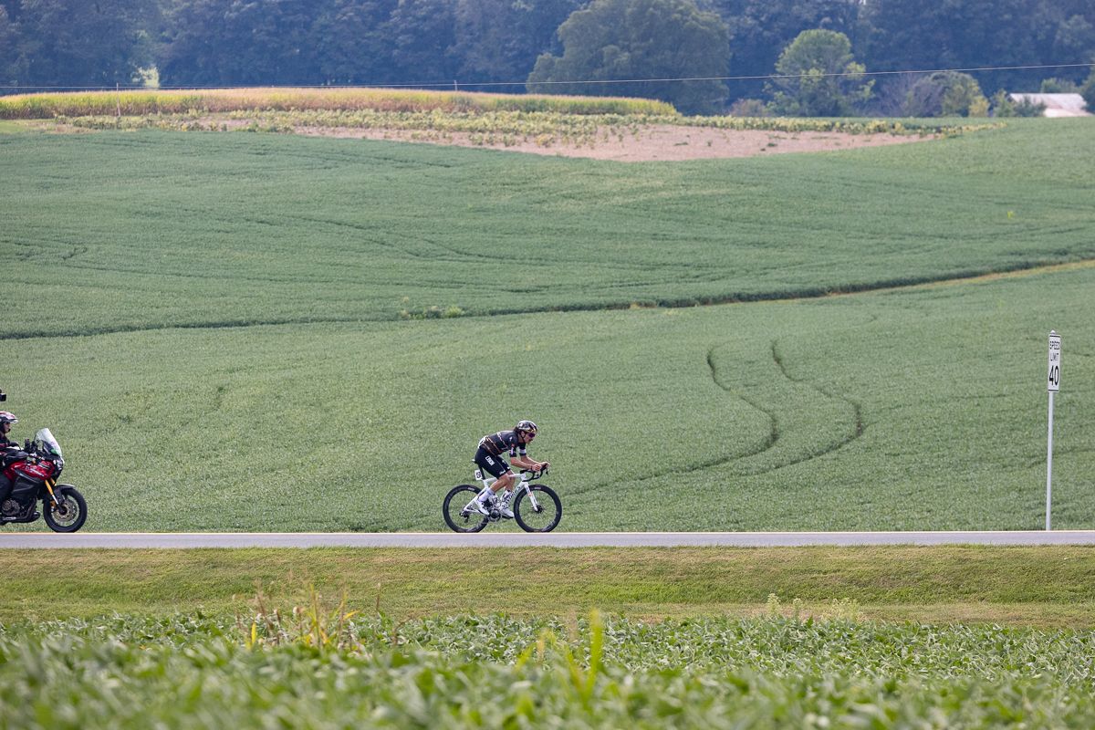 Sam Boardman (L39ION of Los Angeles) made a heroic effort to jump from the field to the break by himself, but was unable to close the gap on a group of 20 working well together.