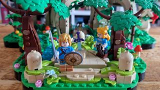 Lego Great Deku Tree Master Sword shrine with Link and Zelda stood in front of it on a wooded pedestal