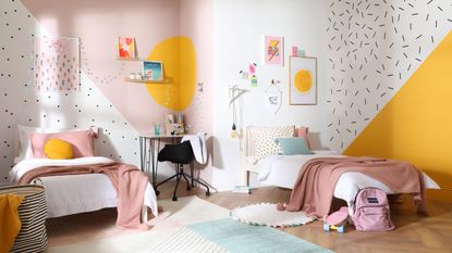 girls' bedroom with yellow and pink walls
