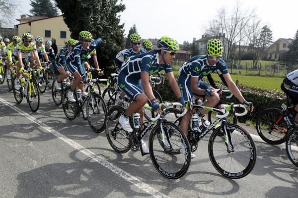 Movistar riders have a chat in the early portion of Milan-San Remo.