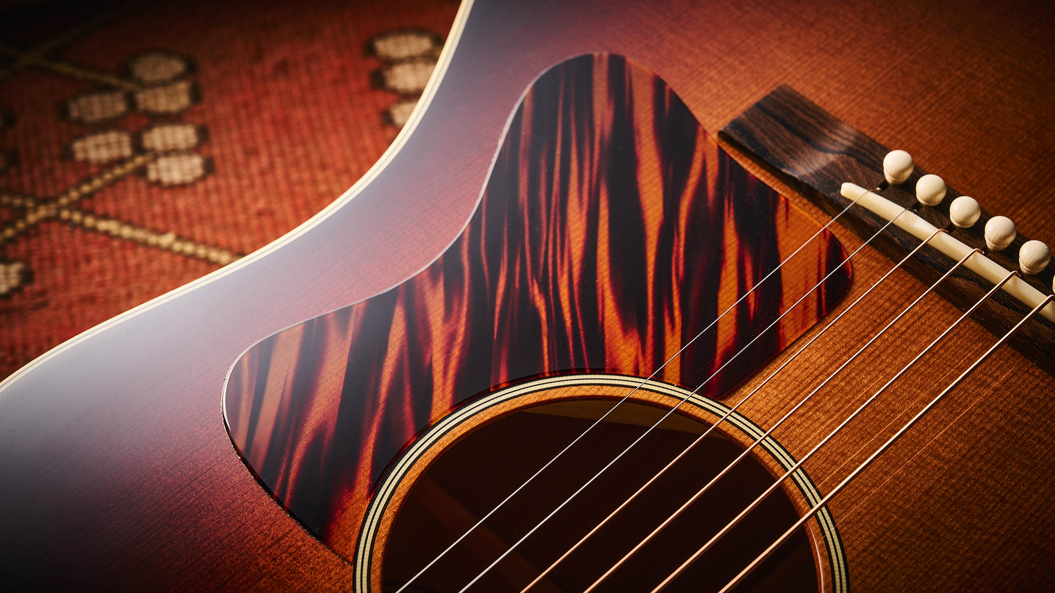 Bourgeois Slope D Standard T/S: Inspired by the J-45, this Touchstone series acoustic has. a beautiful high-gloss finish with a tiger-stripe pickguard