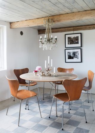 wood and metal dining room in Swedish home