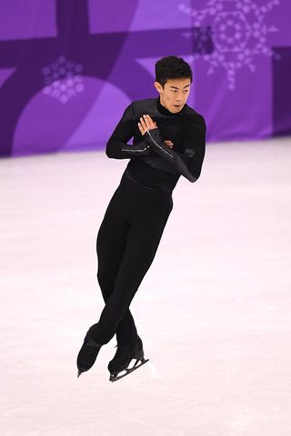 Nathan Chen competes during the figure skating team event.