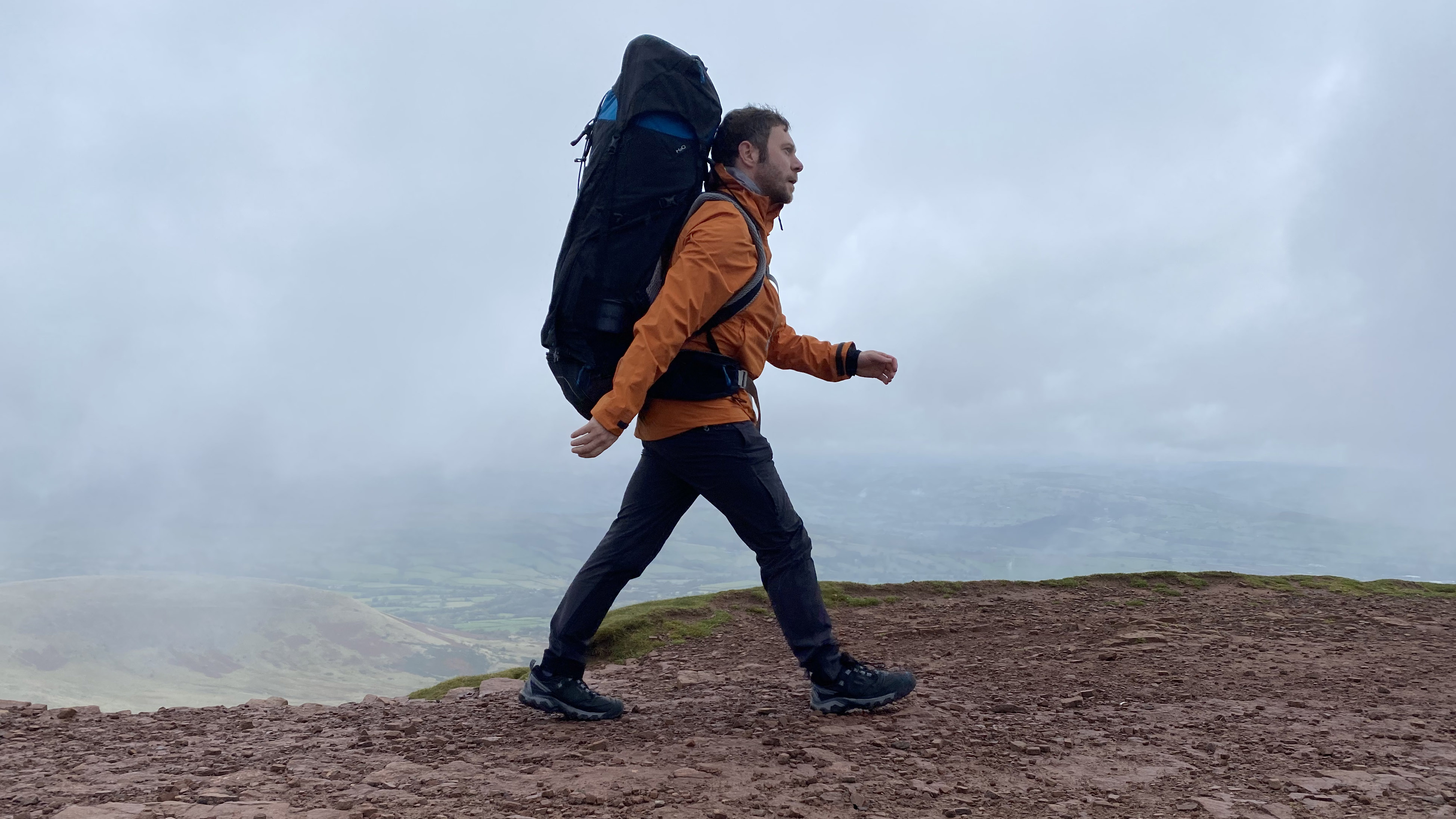 inov-8 Venturelite Jacket: hiking along the summit