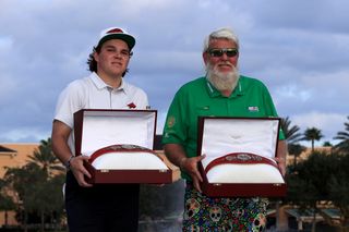 John Daly II and John Daly hold the PNC Championship belts