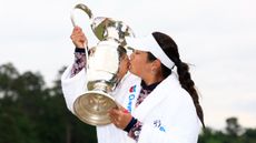 Lilia Vu kisses the Chevron Championship trophy after her 2023 victory