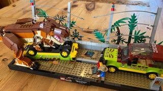 LEGO T. rex Breakout set fully assembled on a wooden table