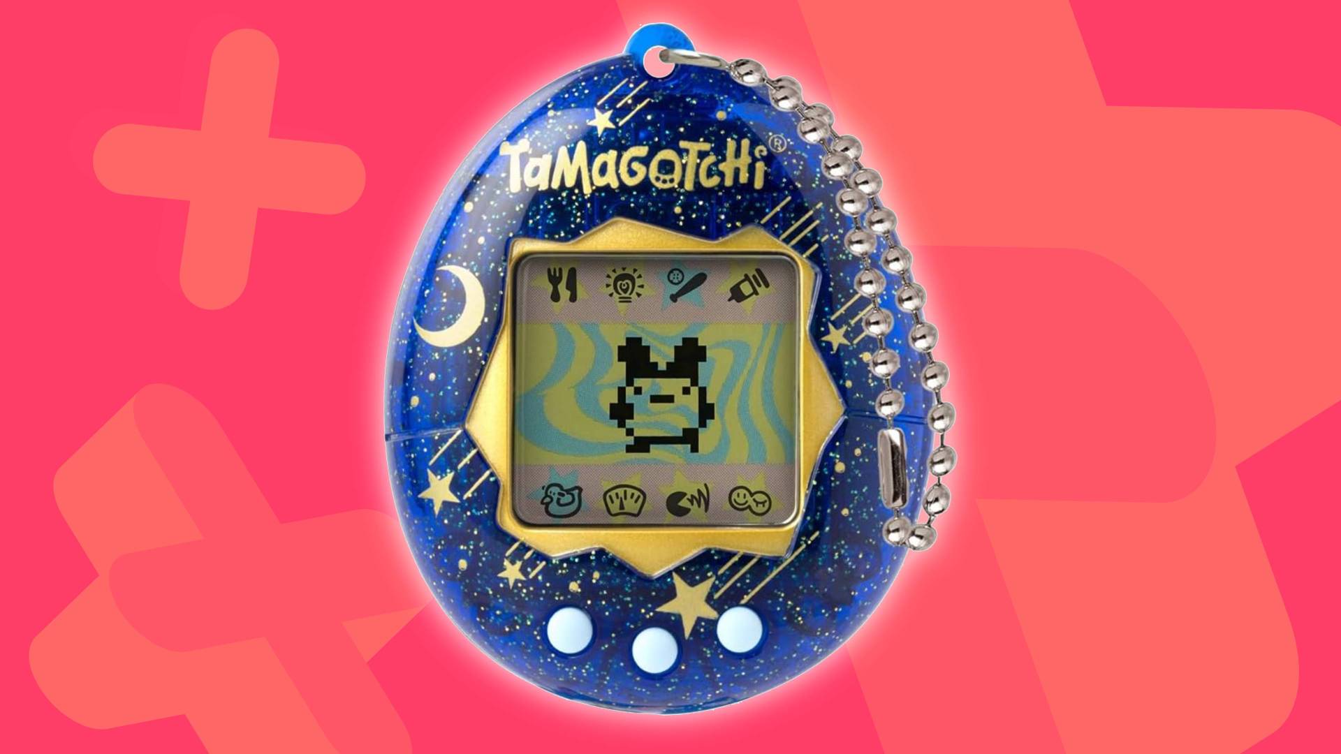 Image of a Bandai Tamagotchi toy on a pink GamesRadar+ background.
