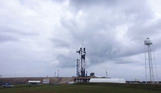 A SpaceX Falcon 9 rocket carrying 60 Starlink internet satellites stands atop Pad 39A of NASA's Kennedy Space Center in Cape Canaveral, Florida during a Sept. 28, 2020 launch attempt.