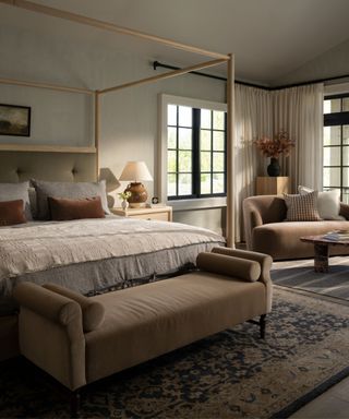 Neutral bedroom with four post bed