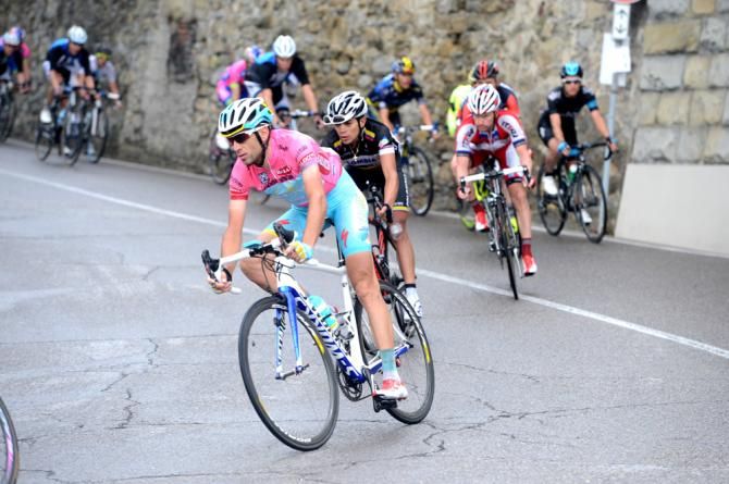 Vincenzo Nibali (Astana) takes another corner in the wet conditions