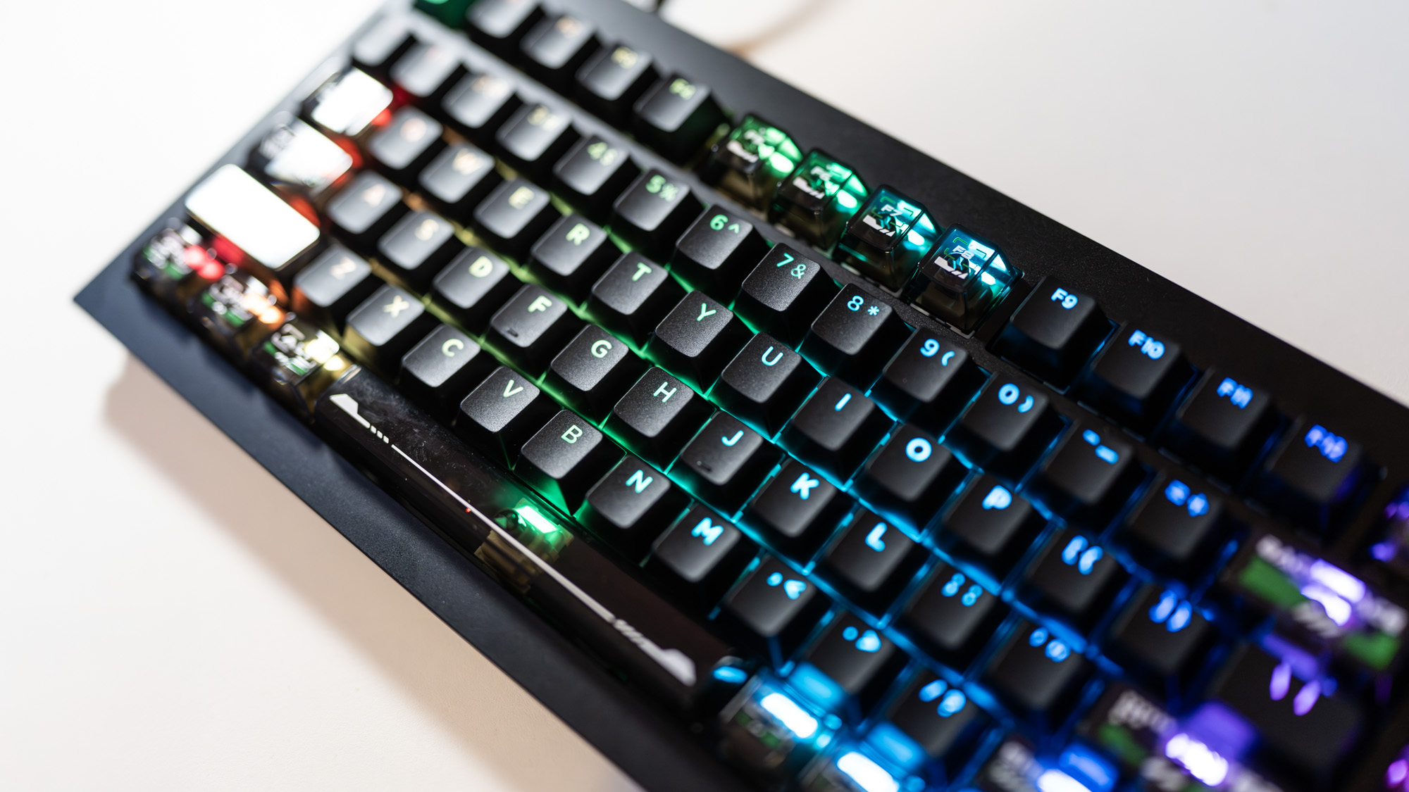 Lemokey L5 HE 8K gaming keyboard with RGB enabled on a desk.