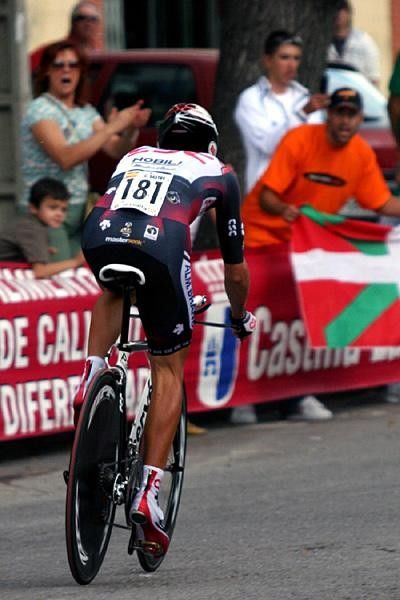 Another crowd favourite, Carlos Sastre (CSC) powers away up the small hill away from the start.