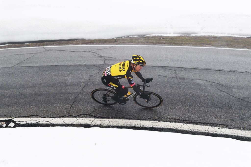 CORTINA DAMPEZZO ITALY MAY 24 Tobias Foss of Norway and Team Jumbo Visma passing through Passo Giau 2233m during the 104th Giro dItalia 2021 Stage 16 a 153km stage shortened due to bad weather conditions from Sacile to Cortina dAmpezzo 1210m Snow Landscape girodiitalia Giro on May 24 2021 in Cortina dAmpezzo Italy Photo by Tim de WaeleGetty Images