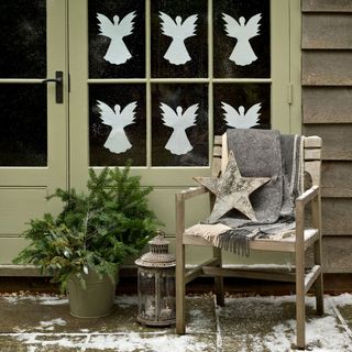 Chrsitmas window paper cut-out decorations with angels