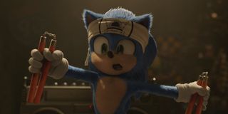 Sonic The Hedgehog holding nunchucks