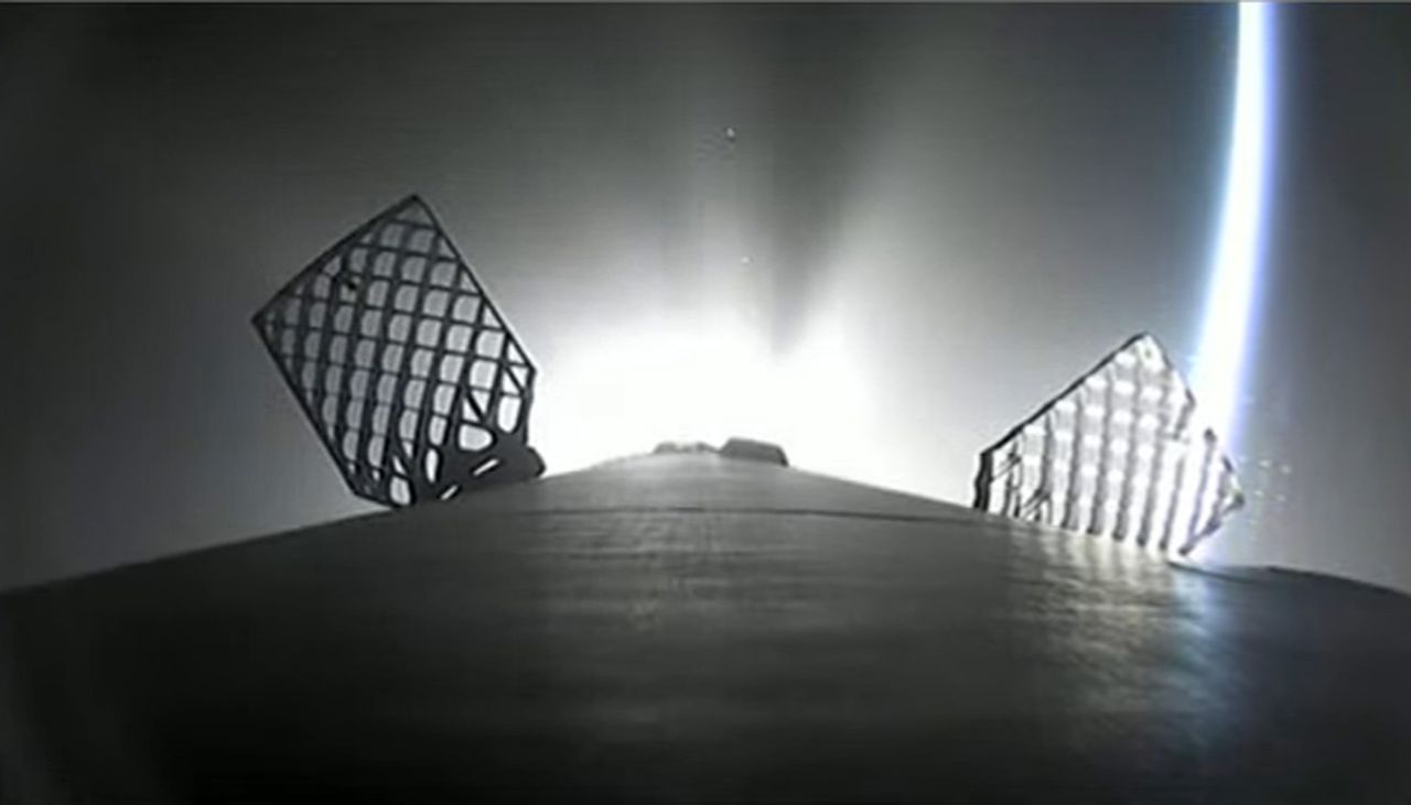 A stunning view of SpaceX's Falcon 9 rocket first stage as it fires its thrusters on the way back to Earth after launching 53 Starlink satellites to orbit from Pad 39A of NASA's Kennedy Space Center in Florida on May 6, 2022.