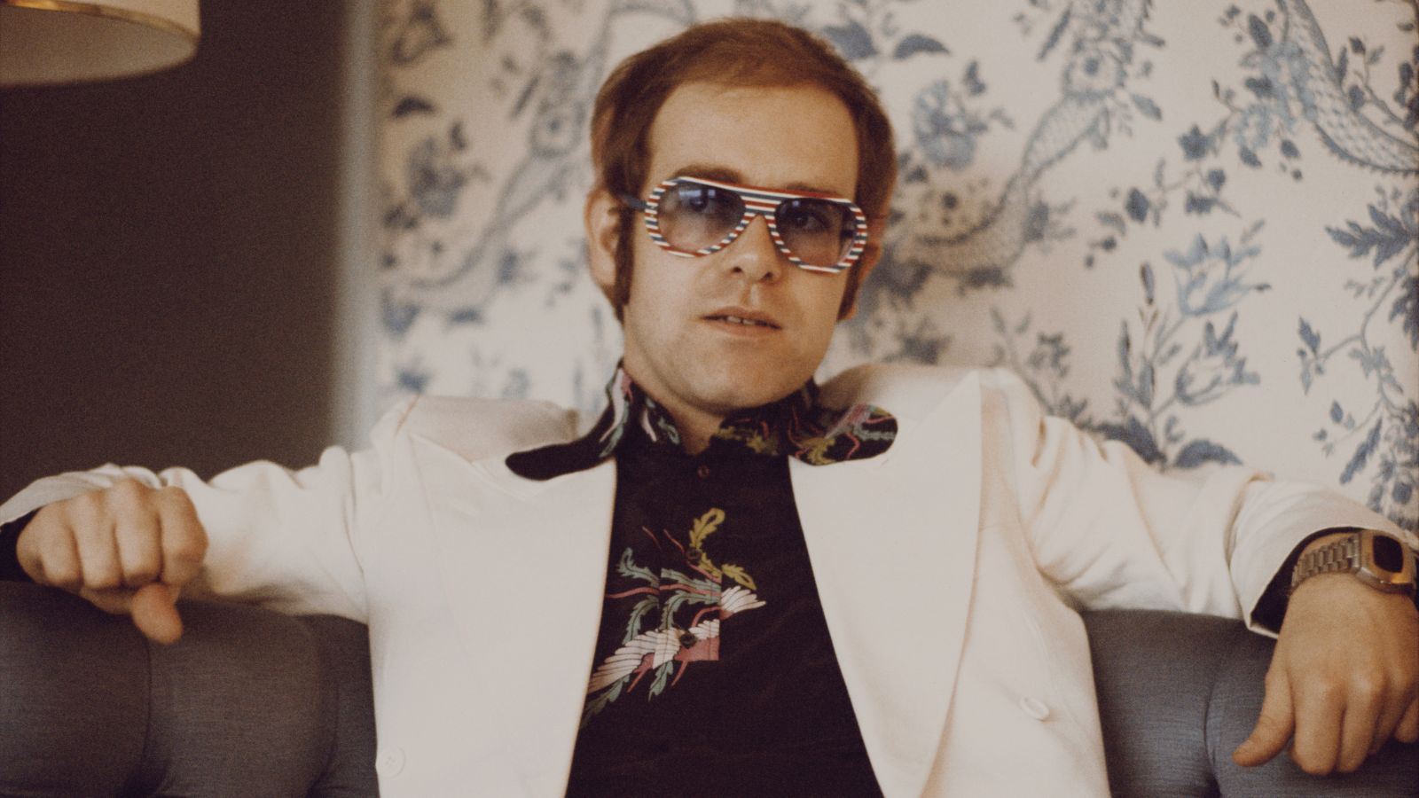 elton john on a wallpaper background