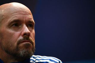 Manchester United manager Erik Ten Hag deep in thought while coaching Ajax