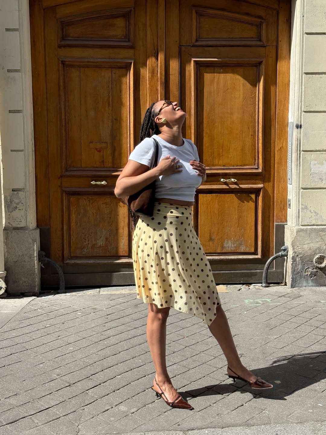 An image of a woman wearing timeless summer outfit