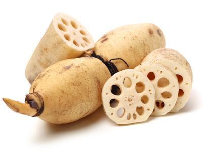 Whole And Sliced Lotus Roots