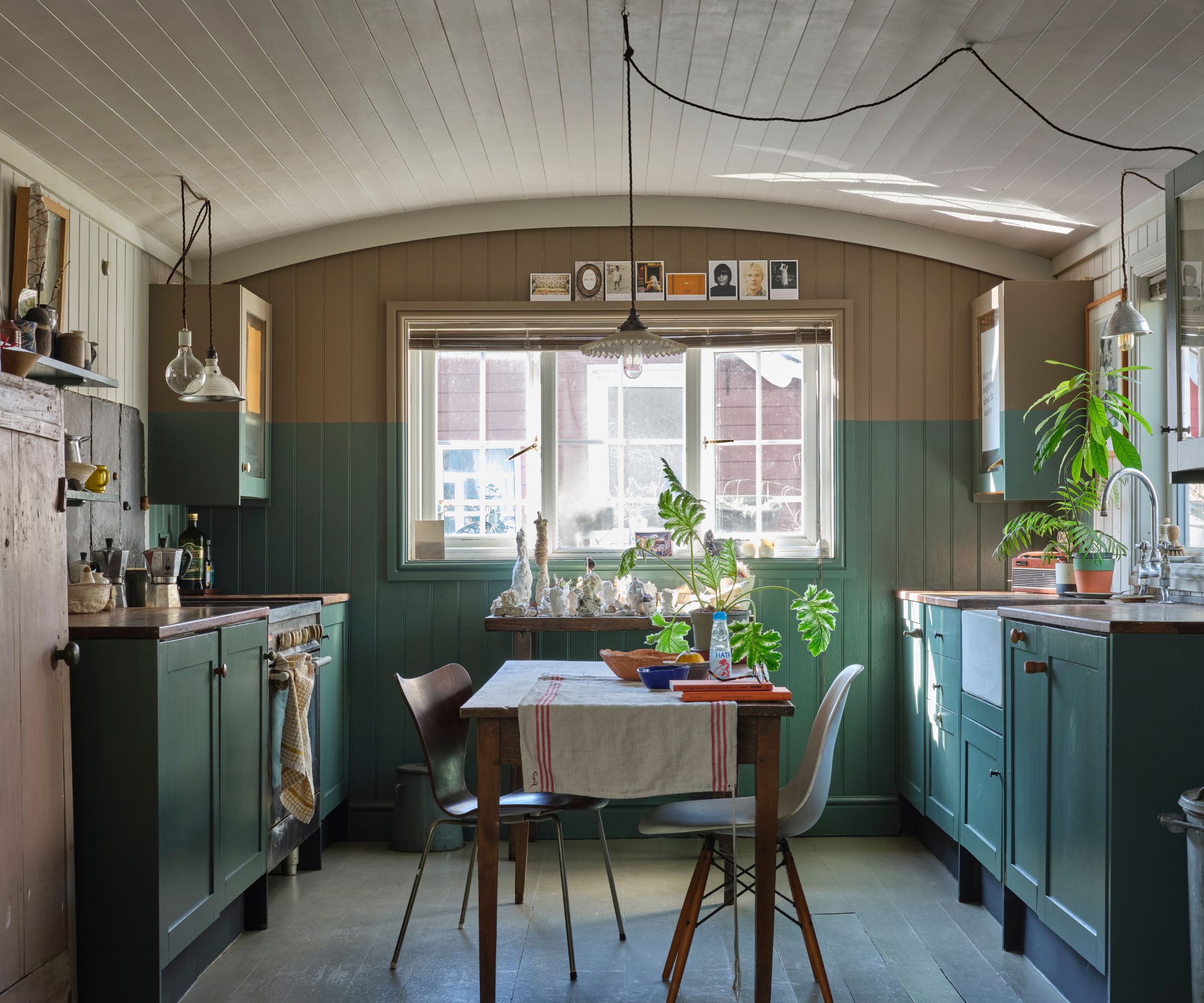 White and green Shepard&#039;s hut kitchen painted in Farrow &amp;amp; Ball&#039;s flat eggshell finish