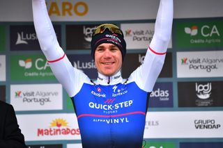FARO PORTUGAL FEBRUARY 18 Fabio Jakobsen of Netherlands and Team QuickStep Alpha Vinyl celebrates winning the stage third on the podium ceremony after the 48th Volta Ao Algarve 2022 Stage 3 a 2114km stage from Almodvar to Faro VAlgarve2022 on February 18 2022 in Faro Portugal Photo by Luc ClaessenGetty Images