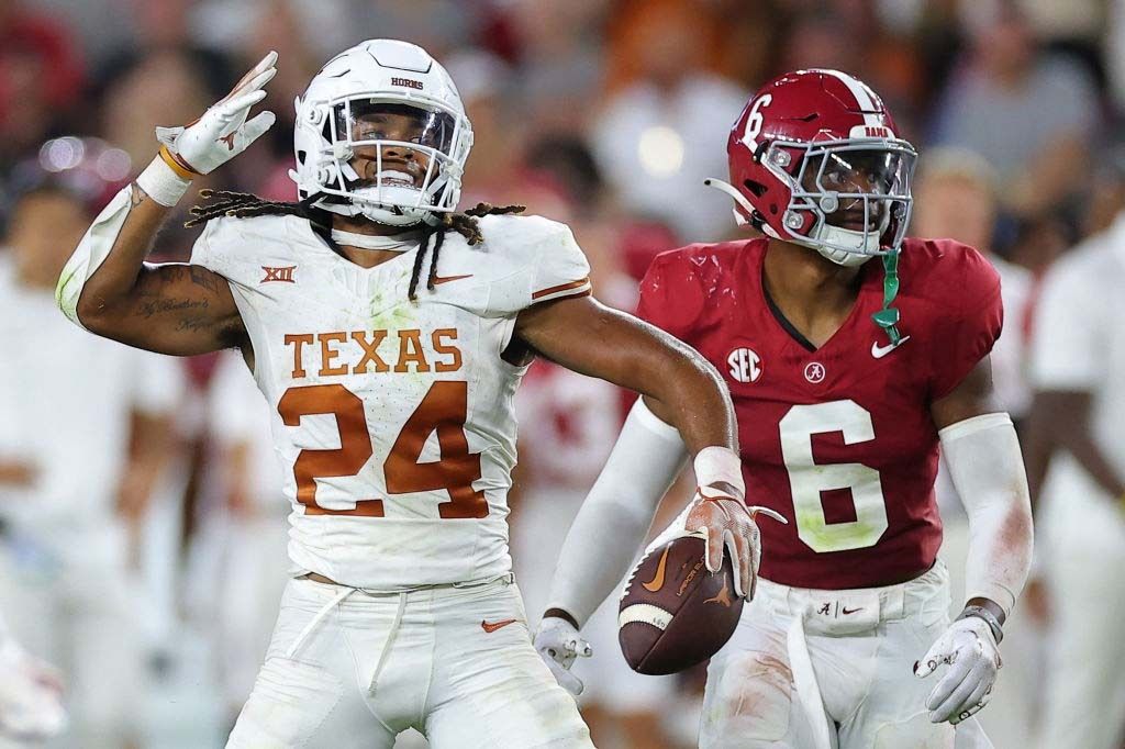 Jonathon Brooks #24 of the Texas Longhorns reacts after rushing for a first down during the fourth quarter against the Alabama Crimson Tide at Bryant-Denny Stadium on September 09, 2023 