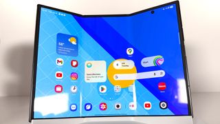 Galaxy Z TriFold shown in hand