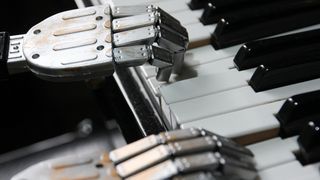 Roboto hands playing piano