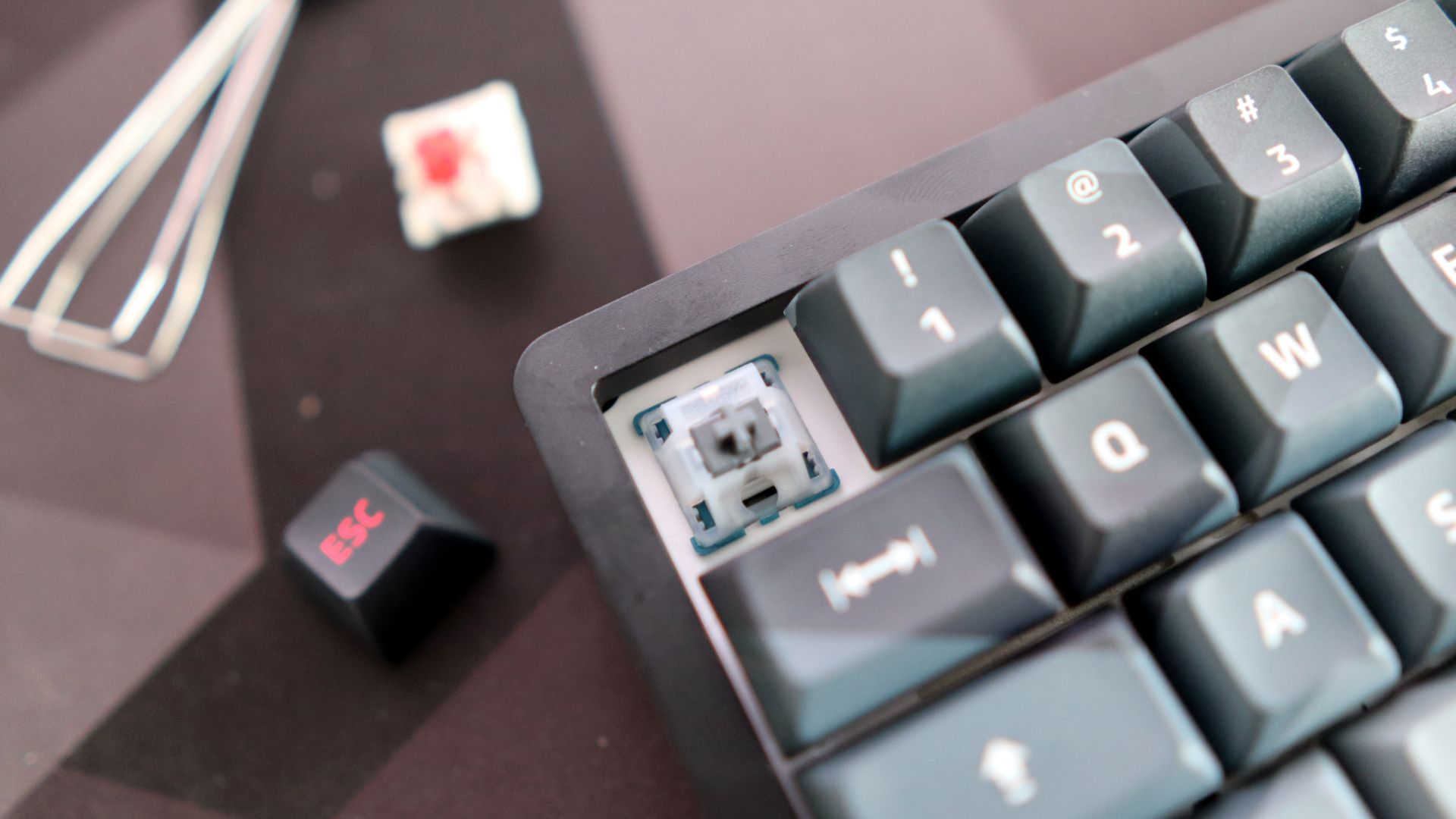 A Das Keyboard DeltaForce 65 gaming keyboard with Cherry MX switches and in camo colourway on a desk.