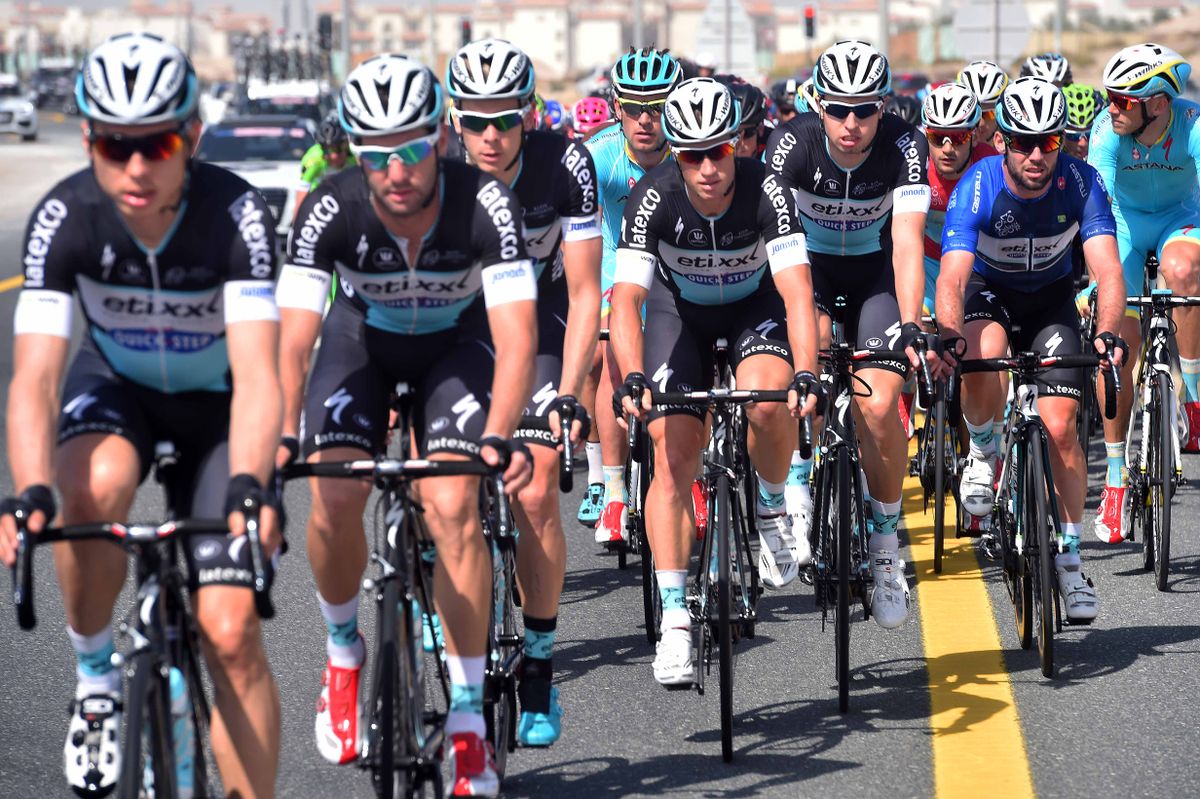 Mark Cavendish sits at the back of the Etixx-QuickStep train
