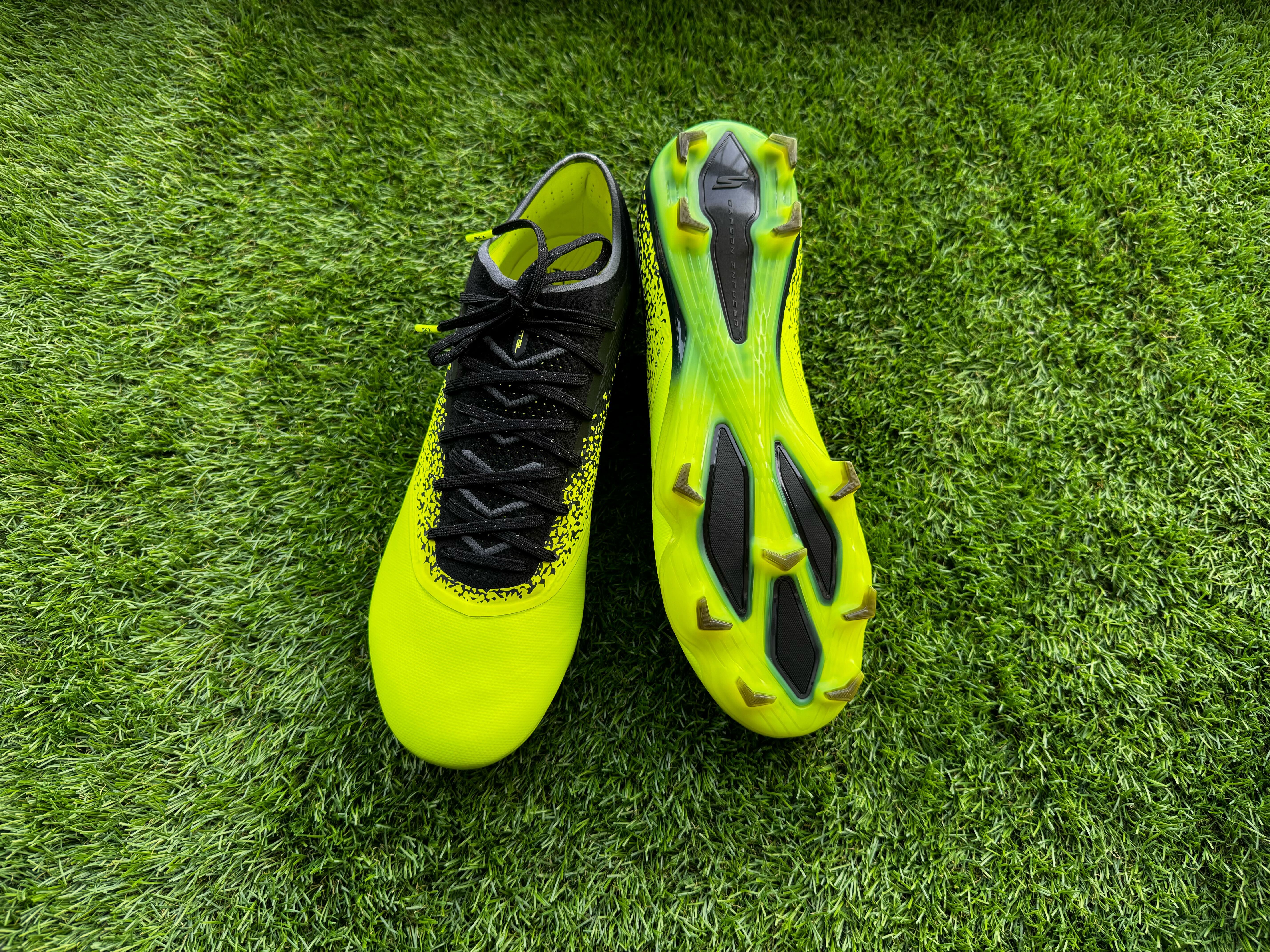 Skechers Razor Elite football boots photographed on a piece of astro turf as a comprehensive review is described