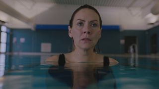 Stevie Nash looks shocked as she takes a swim in Casualty episode two of Supply and Demand.