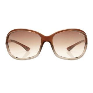 Pair of brown tinted, round frame Tom Ford sunglasses