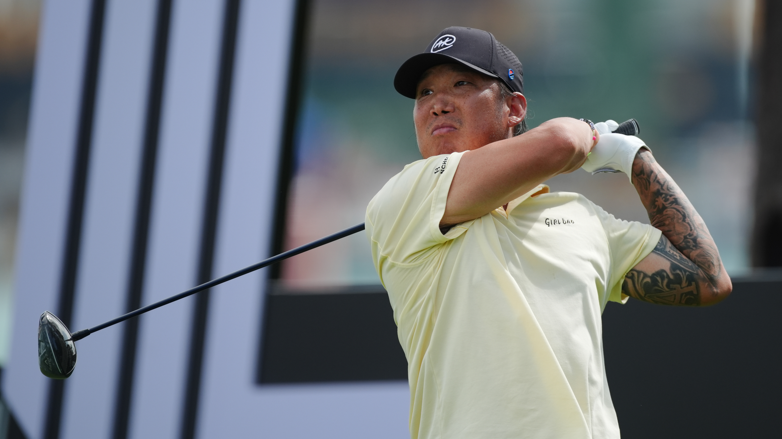 Anthony Kim holds his finish on a drive at LIV Golf Singapore